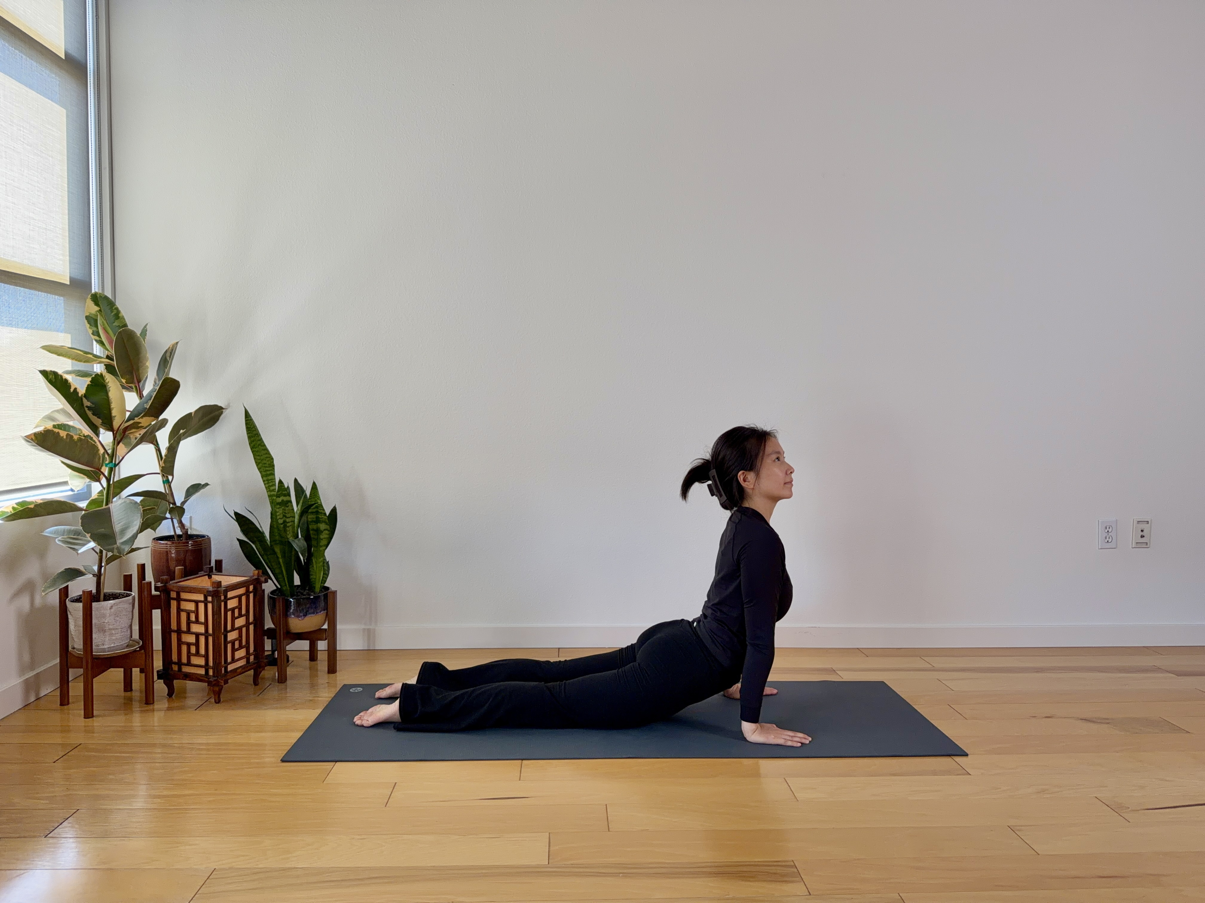 Sophia practicing yoga for the 5-day yoga roadmap.